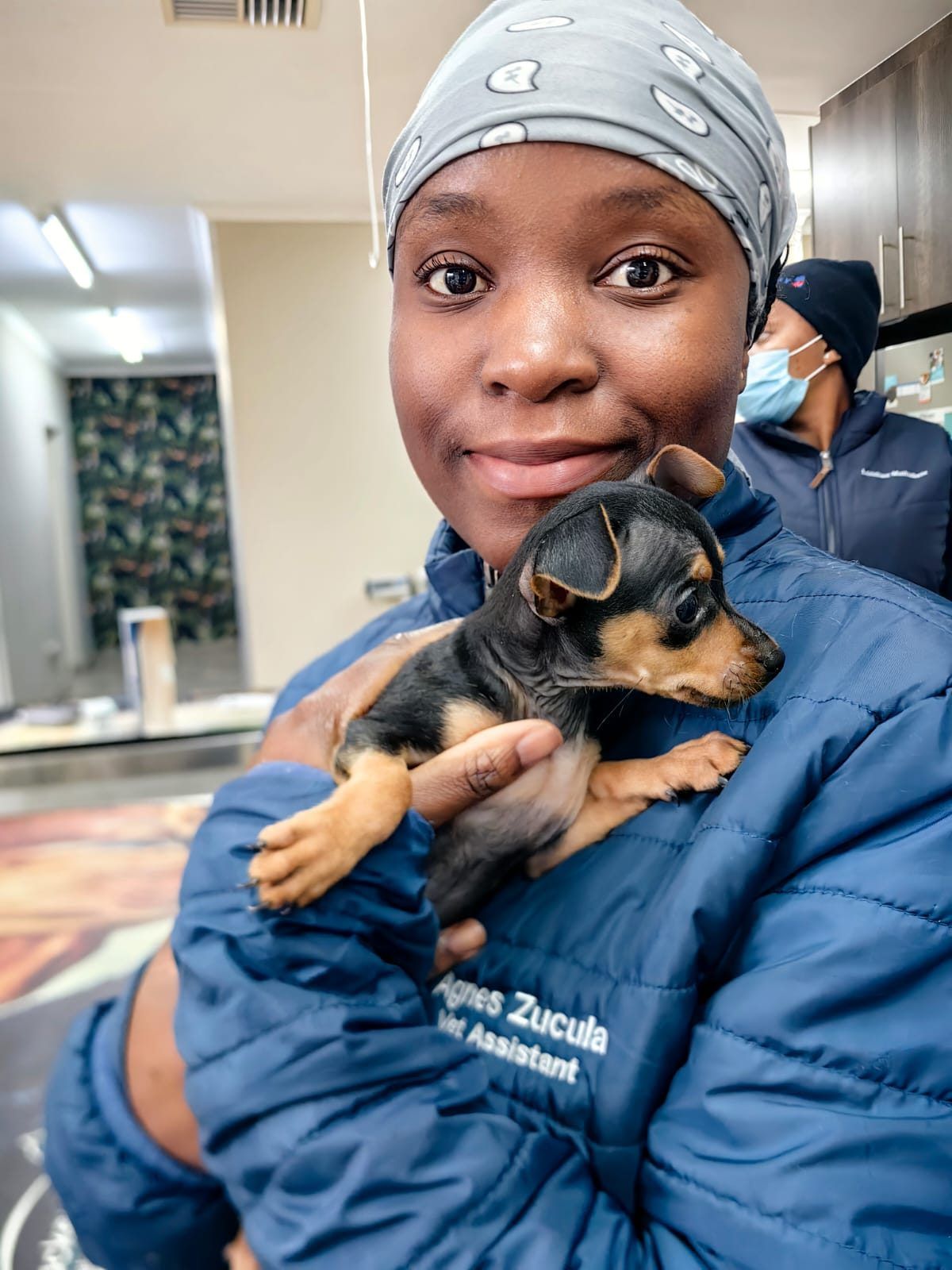 Agnes Zucula with a puppy