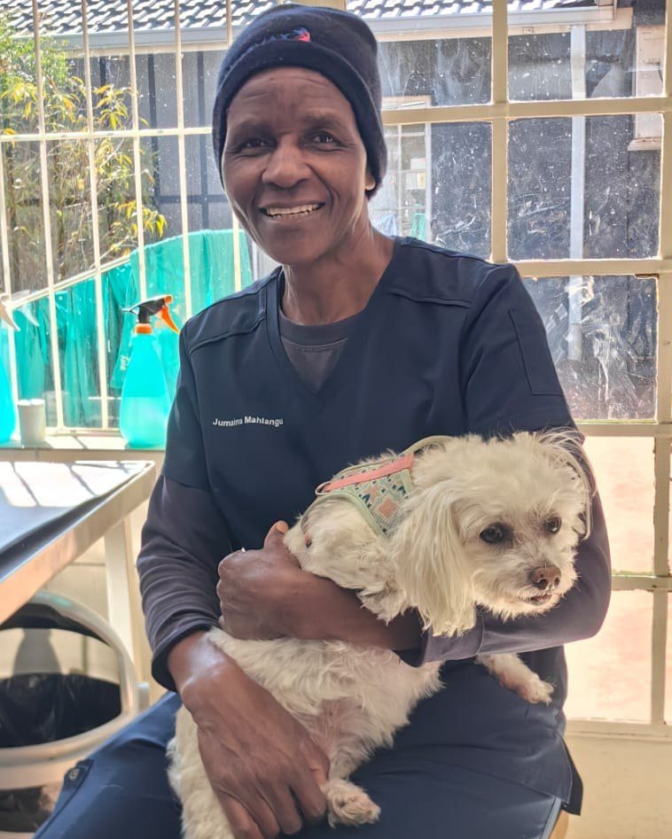 Jumaima Mahlangu with a patient on her lap
